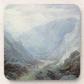 Zahlen, die auf der Bahn durch einen felsigen Gor Untersetzer (Vorderseite)