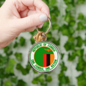 Zambia-RundEmblem Schlüsselanhänger (Hand)