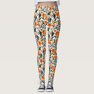 Zarte Frühlingsblumen Orangefarbenes Blumenmuster Leggings