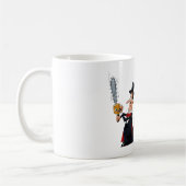 Zauberer sägt Frau in der Hälfte durch Kaffeetasse (Links)