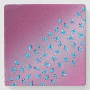 Zauberhafte blaue Schmetterlinge Rosa Steinuntersetzer