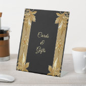 Zeichen der Verzierten Blütentablette in Gold Sockelschild (In SItu)