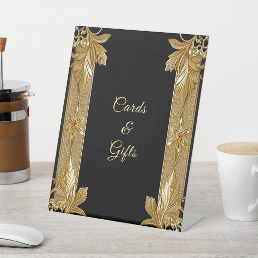 Zeichen der Verzierten Blütentablette in Gold Sockelschild (In SItu)