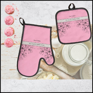 Zeit, das Set des rosa und schwarz-ofen Mitts zu b