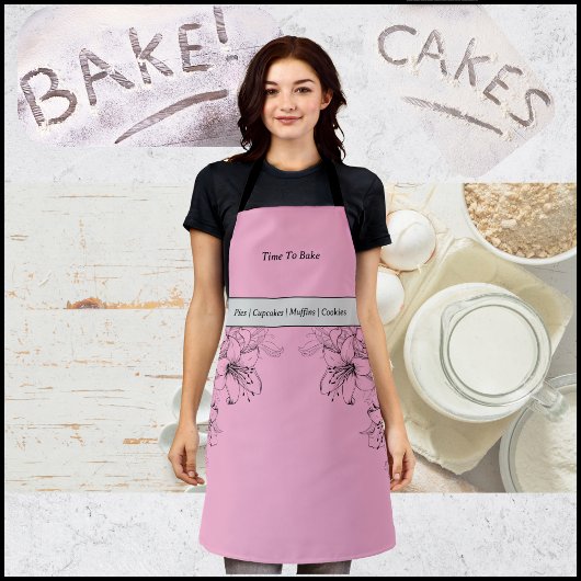 Zeit, rosa und schwarze Schürze zu backen