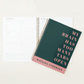 Zeitschrift mit minimaler grün-rosa Schrift Planer (Anzeige)