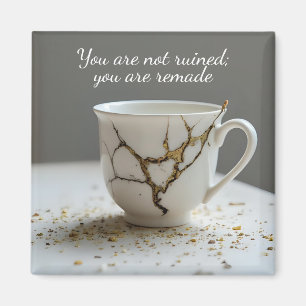zerbrochene Tasse inspirierender Magnet