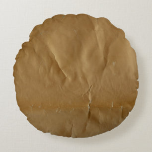 Zerknittertes rotes Papier: grungiger Hintergrund. Rundes Kissen