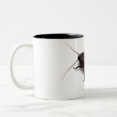 Zerquetschen des Hissers Zweifarbige Tasse (Links)