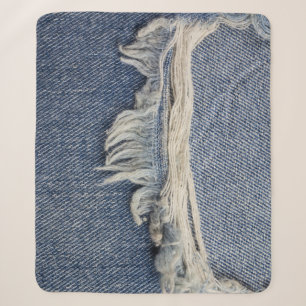 Zerrissene Jeans-Textur, stilvoller Hintergrund. Sherpadecke