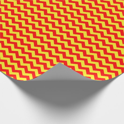 Zickzack Papier mit roten und gelben Streifen Geschenkpapier (Ecke)