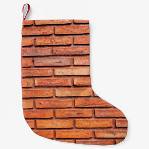 Ziegelmauer orangefarbener Ziegelstein Kleiner Weihnachtsstrumpf