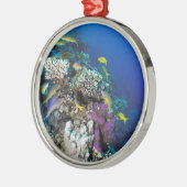 Ziegenschwarm rund um kleine Korallen Ornament Aus Metall (Links)