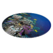 Ziegenschwarm rund um kleine Korallen Schneidebrett (Ecke)