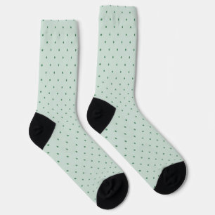 Zierliche grüne Tupfenmuster auf hellgrünem Hinter Socken