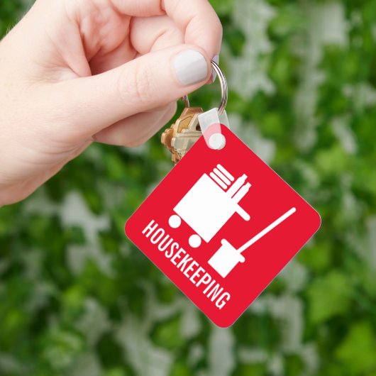 Zimmerreinigung des Hauses Schlüsselanhänger (Hand)