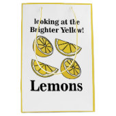 Zitronenfrucht mit Blick auf die hellgelben Zitron Mittlere Geschenktüte (Vorderseite)