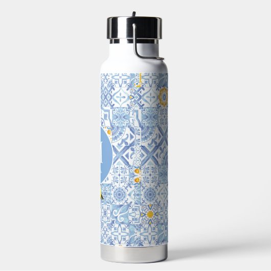 Zitronenfruchtmonogramm, blaue Kachel Trinkflasche (Links)