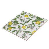 Zitronenzweige mit Blüten und weißen Früchten Fliese (Seite)