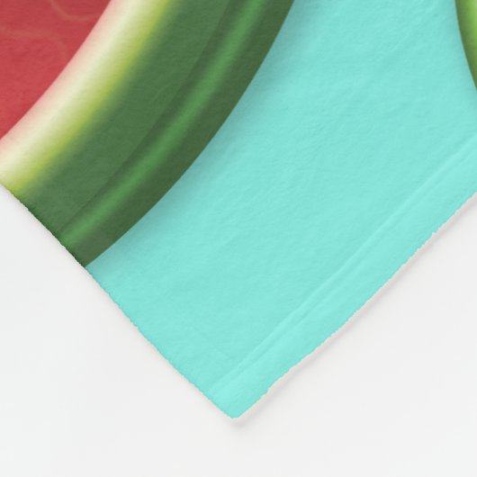 Zitrus Melon Erdbeeren Früchte auf hellblauen Fleecedecke (Ecke)