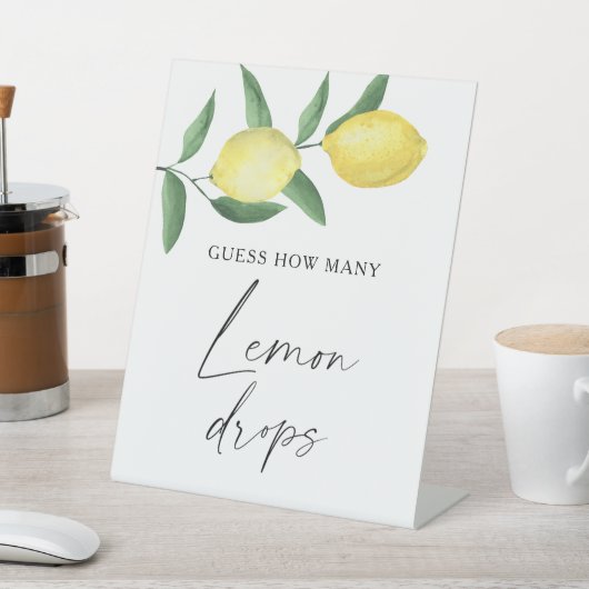 Zitrus - raten Sie, wie viele Zitronentropfen es g Sockelschild (In SItu)