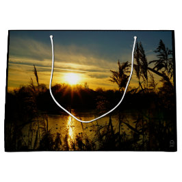 Zonsondergang bij een meertje met rietpluimen. große geschenktüte