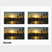 Zonsondergang bij een meertje met rietpluimen. rechteckiger aufkleber (Blatt)