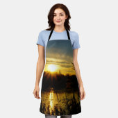 Zonsondergang bij een meertje met rietpluimen. schürze (Getragen)