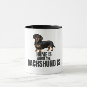 Zu Hause ist da, wo der schwarze und braune Dachsh Tasse