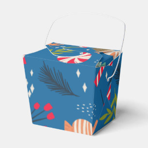 Zuckerstangen und eingewickelte geschenkschachtel