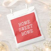 Zuhause Süßes Zuhause-Text-Orange minimalistisches Geschenktütchen (Ausgeschnitten)