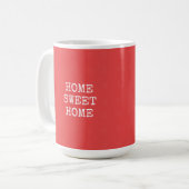 Zuhause-Zuhause-Text in orangefarbenem Rosa Kaffeetasse (Vorderseite Links)