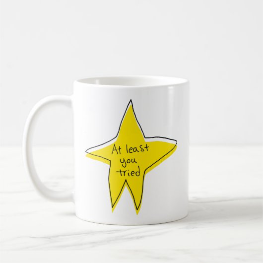 Zumindest hast du versucht - gelber Stern Kaffeetasse (Links)
