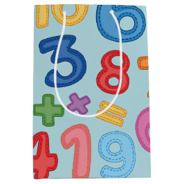 Zurück zu den Schulzahlen im hellblauen Hintergrun Mittlere Geschenktüte