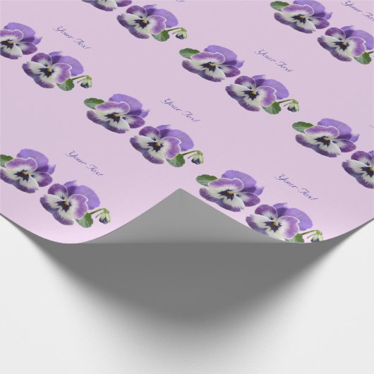 Zusammengepaßtes Stiefmütterchen Ihr eigenes Geschenkpapier (Ecke)