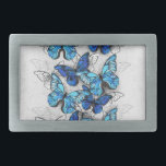 Zusammensetzung von White und Blue Butterflies Rechteckige Gürtelschnalle<br><div class="desc">Vertikale Zusammensetzung von Realität,  Blue and White Morpho Butterflies on gray textured background. Morpho blue butterfly.</div>