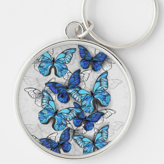Zusammensetzung von White und Blue Butterflies Schlüsselanhänger (Vorne)