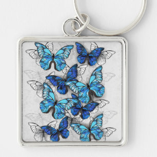 Zusammensetzung von White und Blue Butterflies Schlüsselanhänger