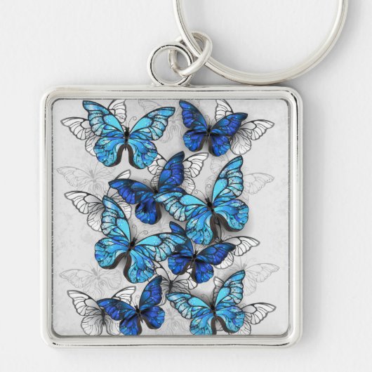 Zusammensetzung von White und Blue Butterflies Schlüsselanhänger (Vorne)