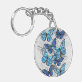 Zusammensetzung von White und Blue Butterflies Schlüsselanhänger (Vorderseite links)