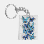 Zusammensetzung von White und Blue Butterflies Schlüsselanhänger (Vorderseite links)