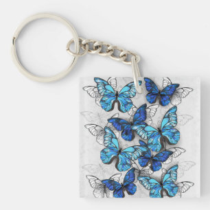 Zusammensetzung von White und Blue Butterflies Schlüsselanhänger