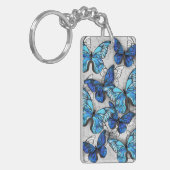 Zusammensetzung von White und Blue Butterflies Schlüsselanhänger (Vorderseite links)