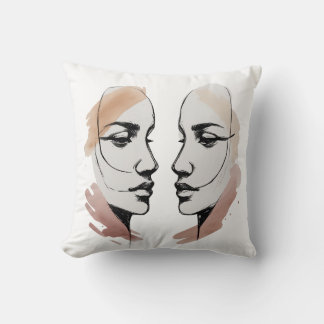 Zwei abstrakte Gesichter, ein Kissen mit einer Lin