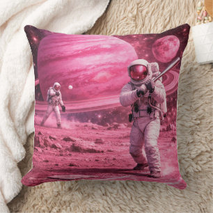 Zwei Astronauten spielen Baseball auf dem rosa Pla Kissen