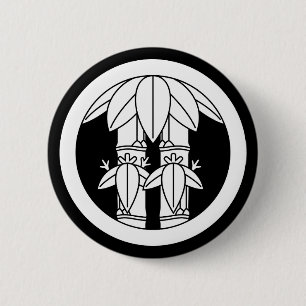 Zwei Bambus mit Bambusblättern im Kreis Button
