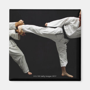 Zwei Blackbelts, das 2 Sparring ist Magnet