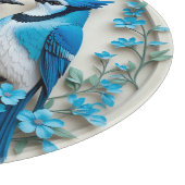 Zwei blaue Jay, die auf einer Zweigstelle stehen Schneidebrett (Ecke)