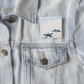 Zwei blaue Seesterne am Rande des Wassers auf trop Button (Beispiel)