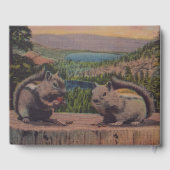 Zwei Chipsteine auf Stump in Mountains Lake Gästebuch (Rückseite)